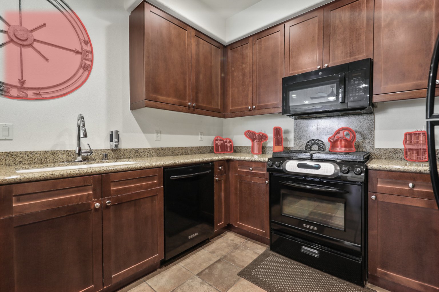 Kitchen with countertop clutter selected for removal